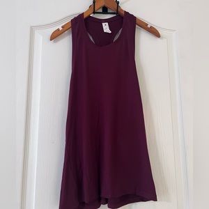 NWT yogalicious top. Super soft with Racerback. Size small